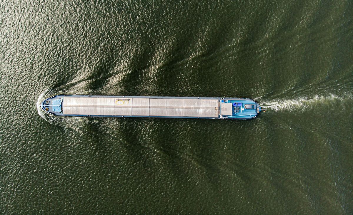 Aerial view of a barge under way